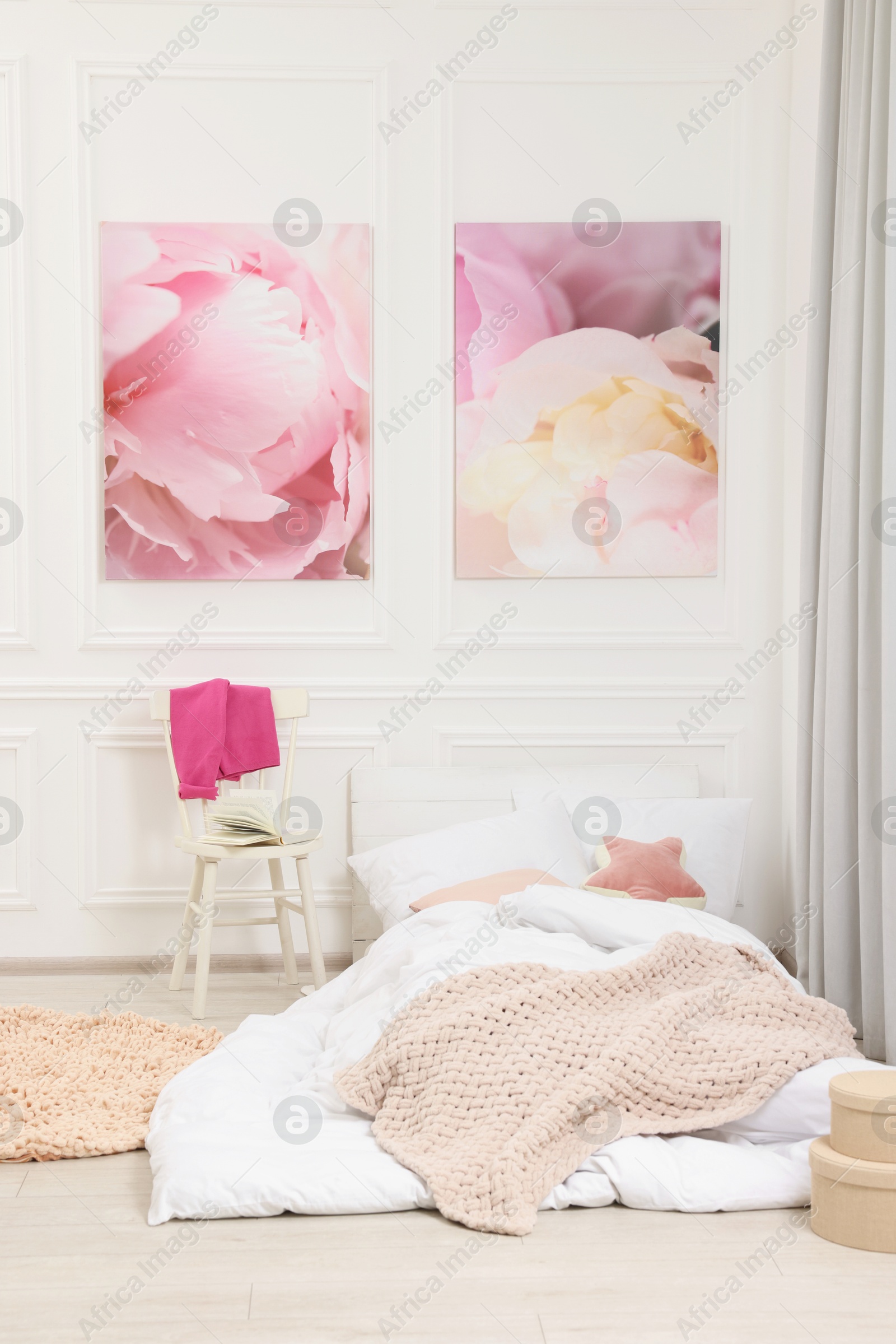 Photo of Cute child's room interior with swing and beautiful pictures of on wall