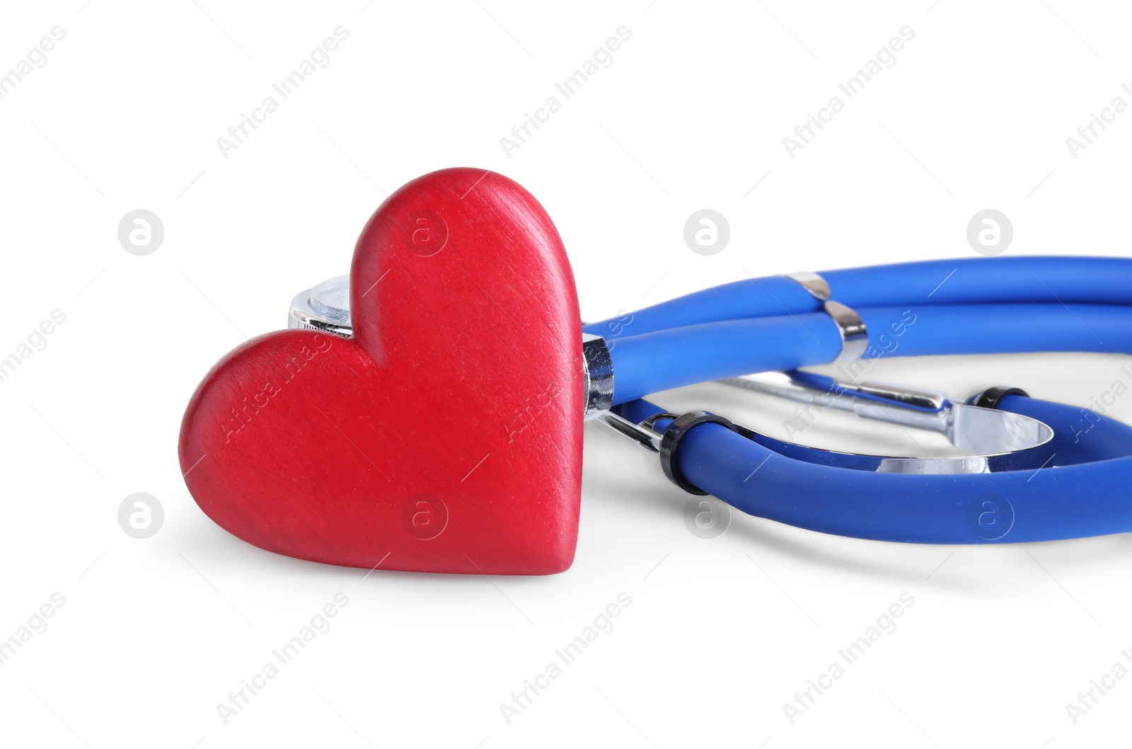 Photo of Stethoscope and red heart on wooden table against white background, space for text