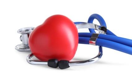 Stethoscope and red heart on wooden table against white background, space for text