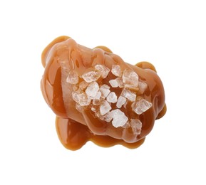 Yummy candy with caramel sauce and sea salt isolated on white, top view