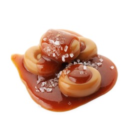 Yummy candies with caramel sauce and sea salt isolated on white