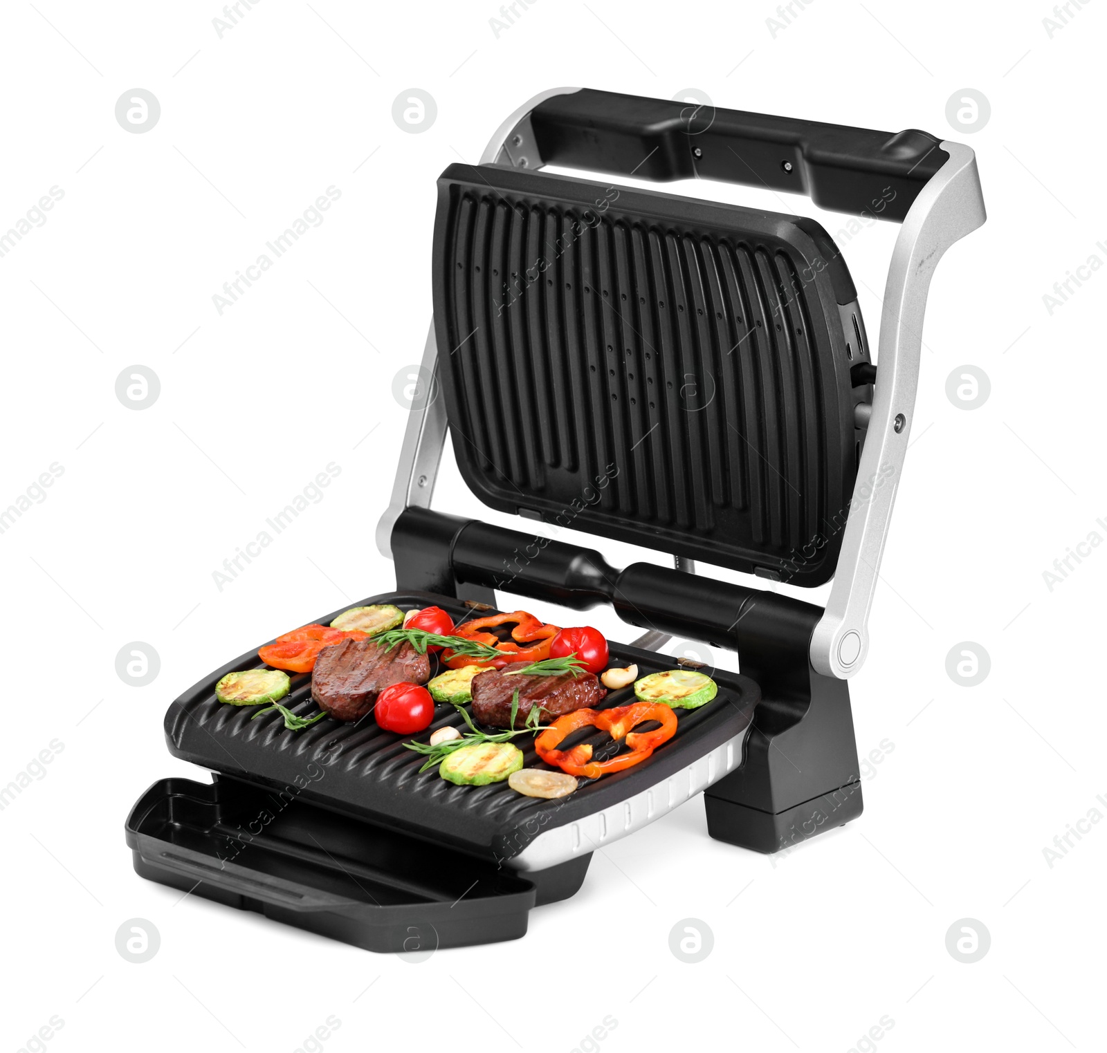 Photo of Electric grill with tasty meat, rosemary and vegetables isolated on white