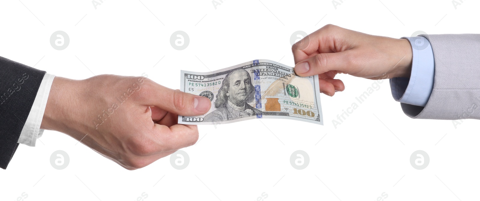 Photo of Money exchange. Man giving dollar banknote to woman on white background, closeup