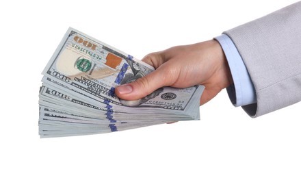 Photo of Money exchange. Woman holding dollar banknotes on white background, closeup