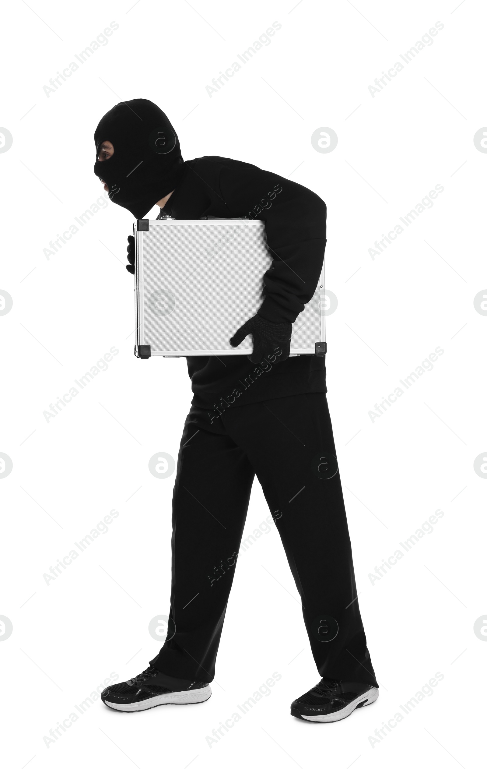 Photo of Thief in balaclava with briefcase of money on white background