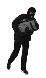 Thief in balaclava running with bag on white background