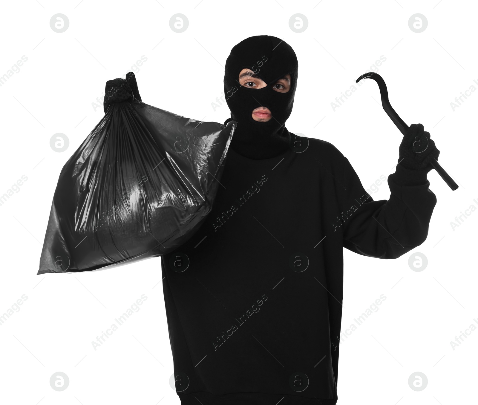 Photo of Thief in balaclava with crowbar and bag raising hands on white background