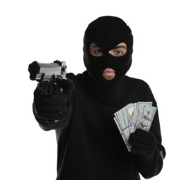 Thief in balaclava with gun and money on white background