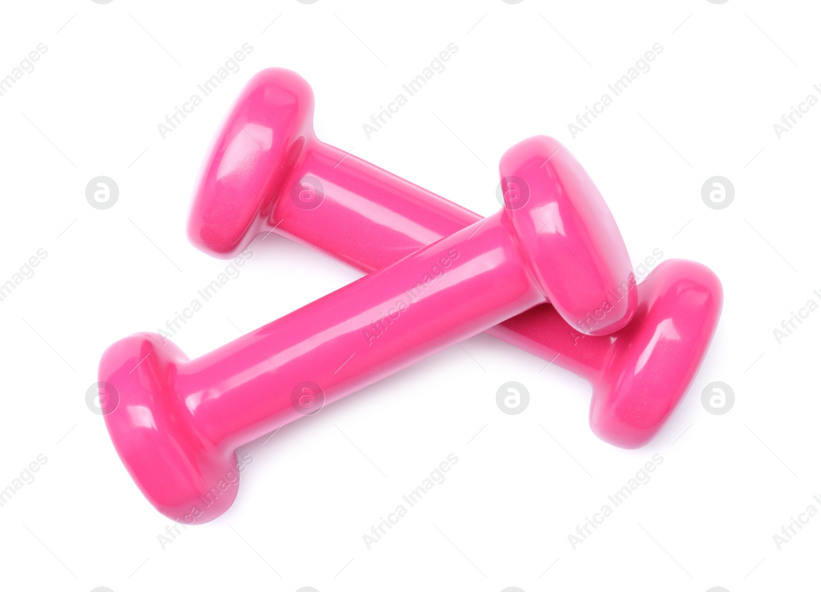 Photo of Pink dumbbells isolated on white, top view. Sports equipment