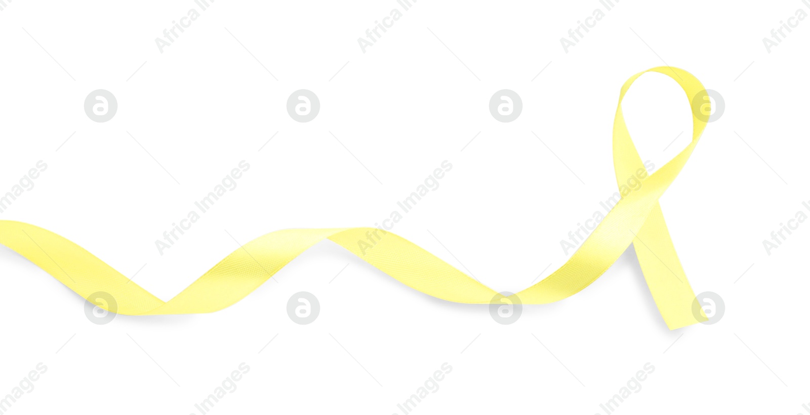 Photo of Yellow awareness ribbon isolated on white, top view