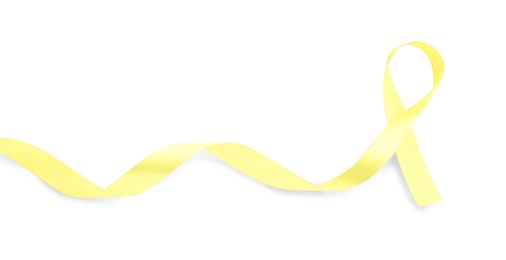 Photo of Yellow awareness ribbon isolated on white, top view