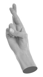 Image of Woman's hand crossing fingers on white background, closeup. Black and white effect