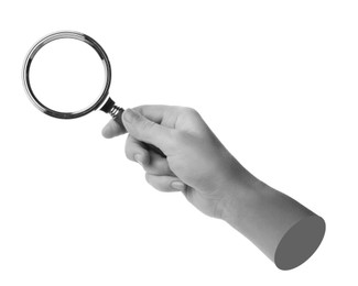 Image of Woman's hand with magnifying glass on white background. Black and white effect