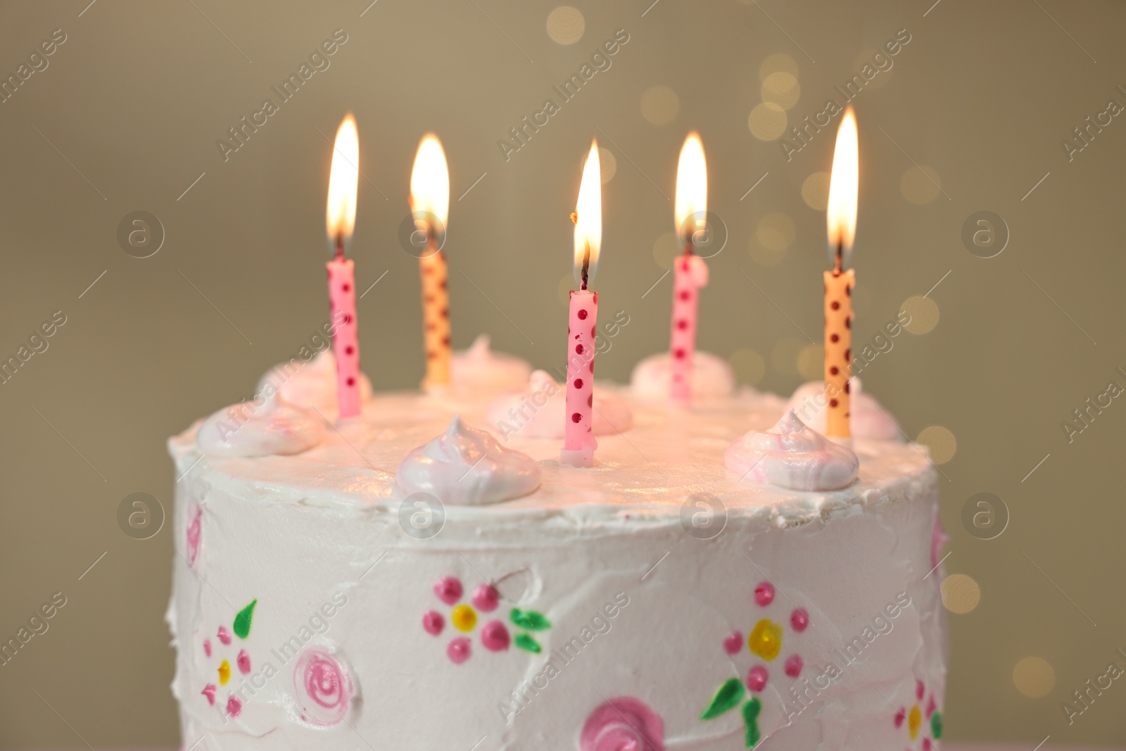 Photo of Tasty Birthday cake with burning candles against blurred background, closeup