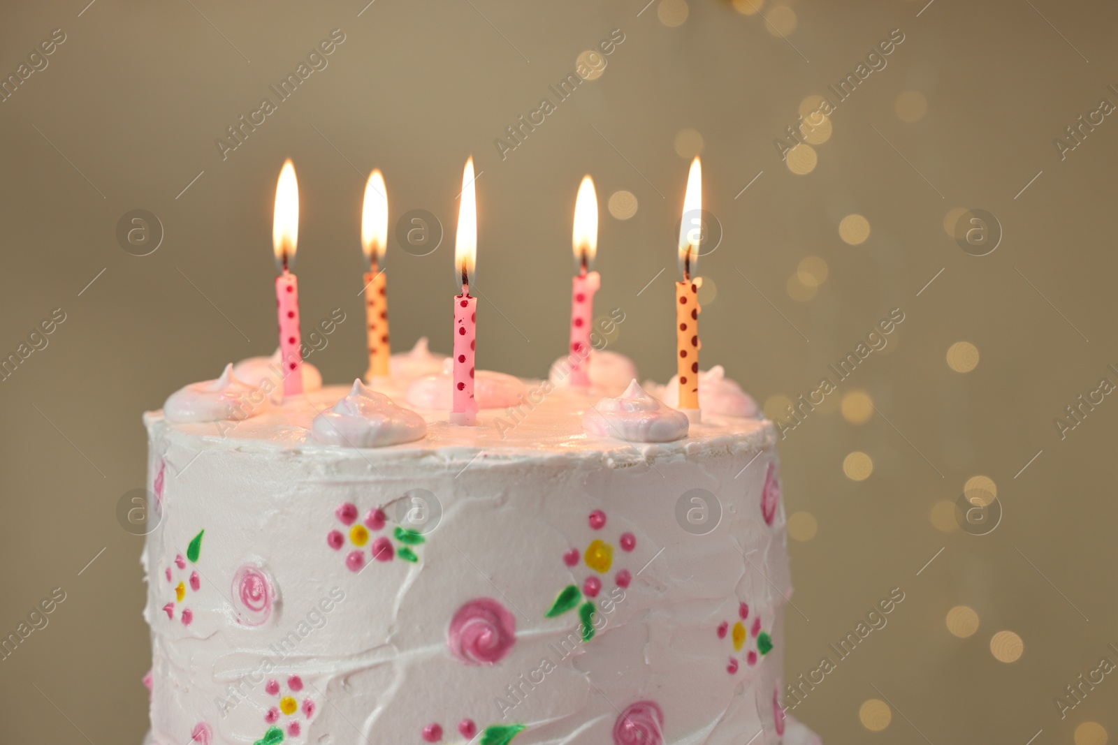 Photo of Tasty Birthday cake with burning candles against blurred background, closeup