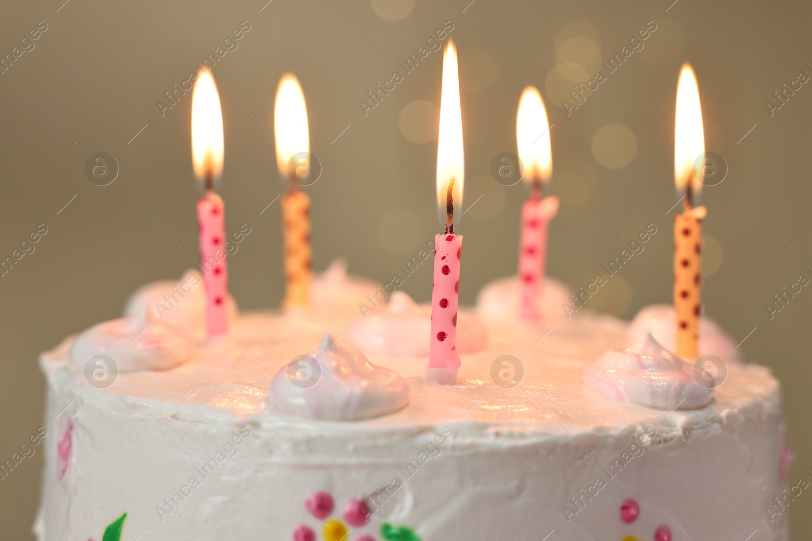 Photo of Tasty Birthday cake with burning candles against blurred background, closeup