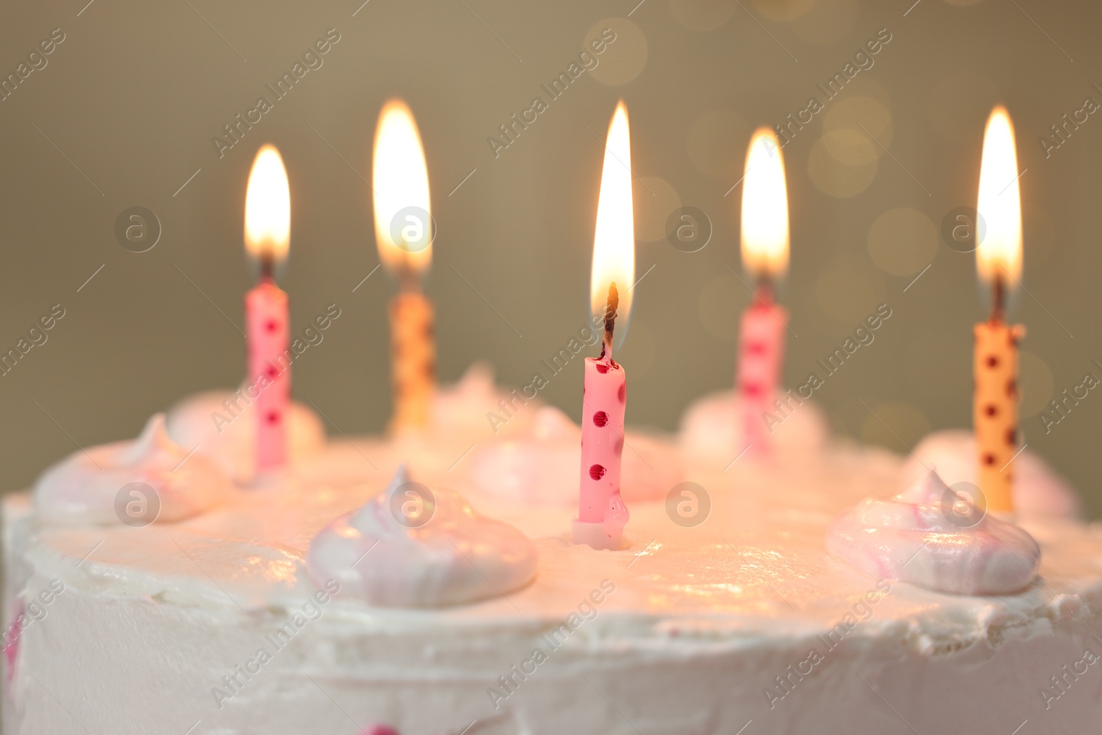 Photo of Tasty Birthday cake with burning candles against blurred background, closeup