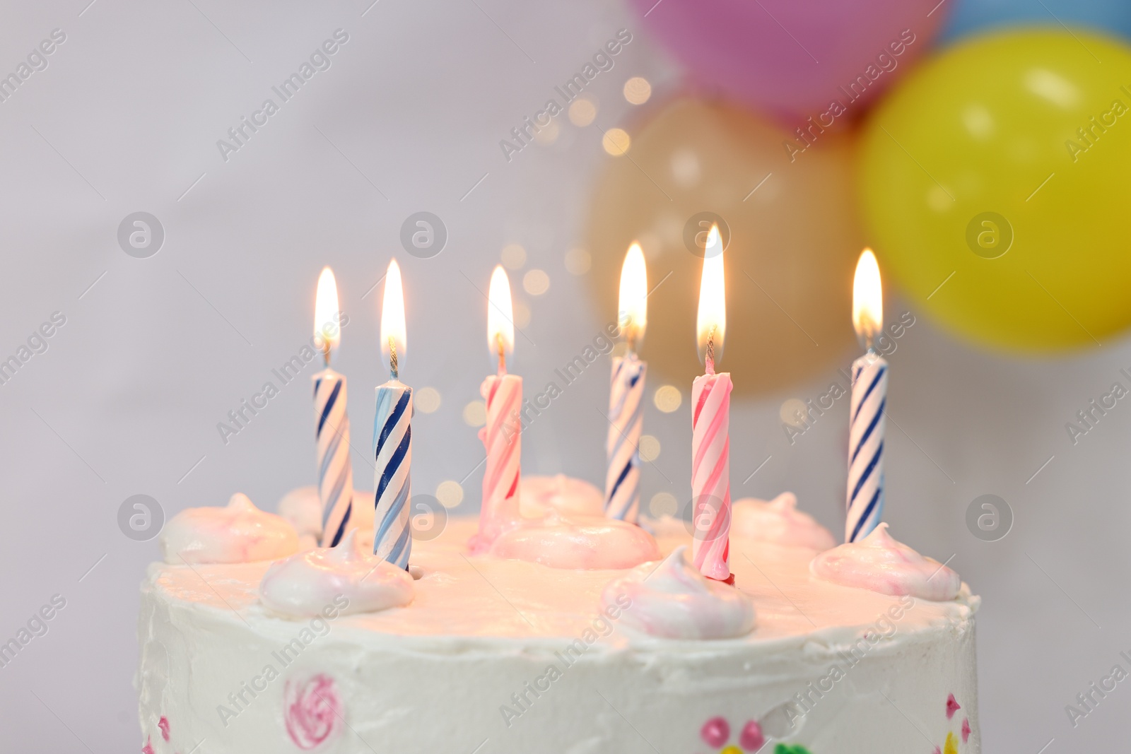 Photo of Tasty Birthday cake with burning candles against blurred background, closeup