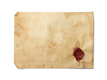 Photo of Sheet of old parchment paper with wax stamp isolated on white, top view