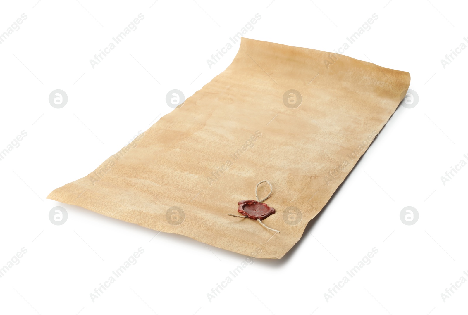 Photo of Sheet of old parchment paper with wax stamp isolated on white