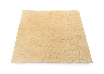 Sheet of old parchment paper isolated on white