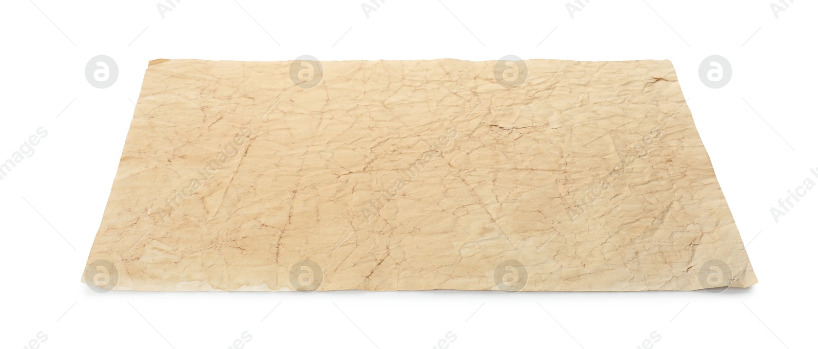 Photo of Sheet of old parchment paper isolated on white