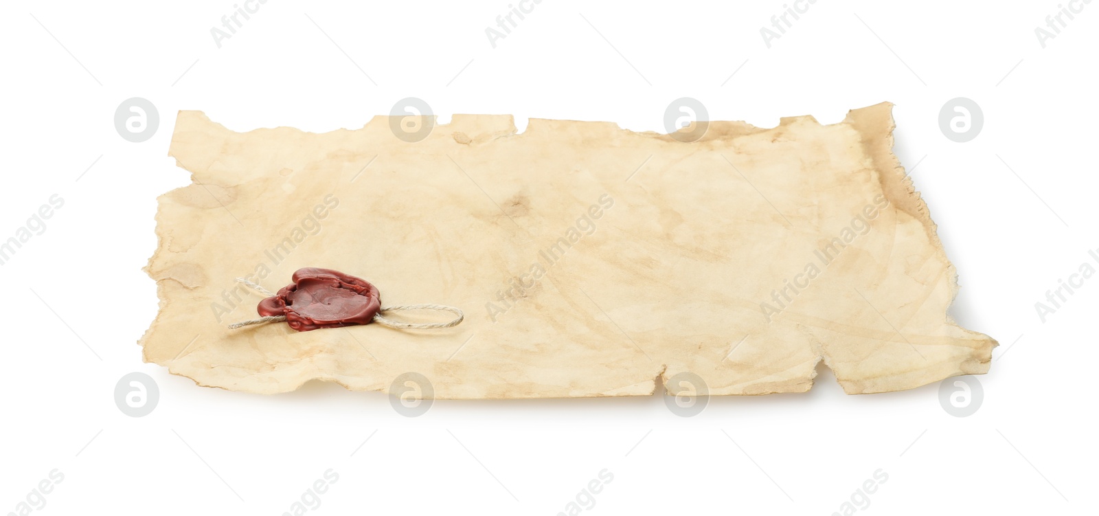 Photo of Sheet of old parchment paper with wax stamp isolated on white