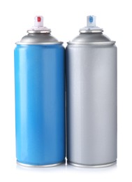 Photo of Two spray paint cans isolated on white