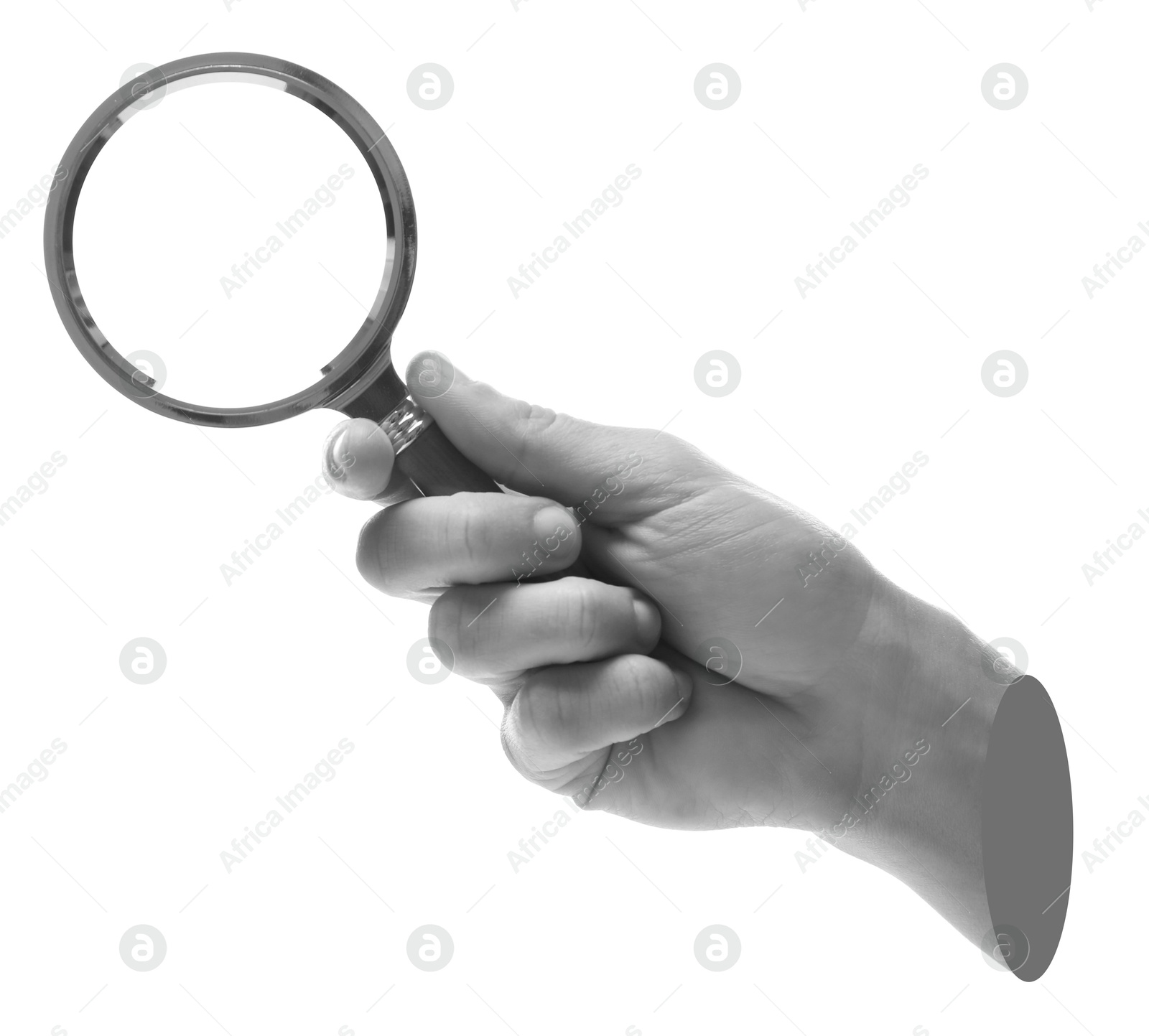 Image of Woman's hand with magnifying glass on white background. Black and white effect