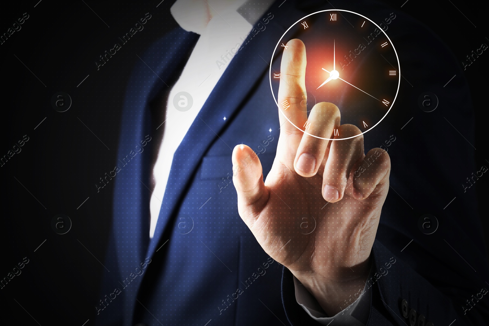 Image of Businessman touching virtual clock on dark background, closeup