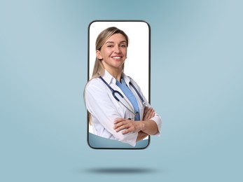 Online medical consultation. Doctor on smartphone screen against light blue background
