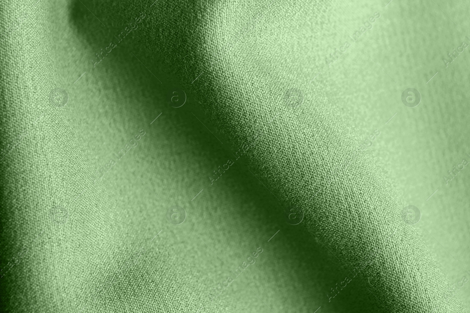Image of Beautiful sage green fabric as background, closeup