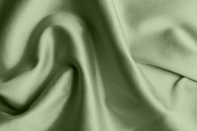 Beautiful sage green fabric as background, closeup