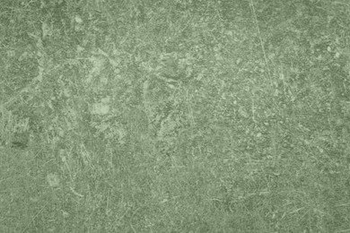 Image of Sage green textured surface as background, closeup