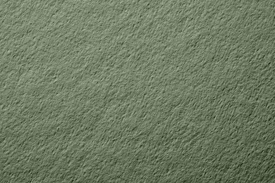 Image of Sage green paper sheet as background, closeup