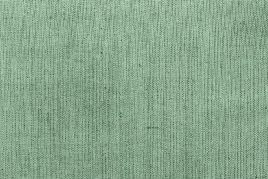 Beautiful sage green fabric as background, closeup