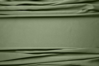 Image of Beautiful sage green fabric as background, closeup