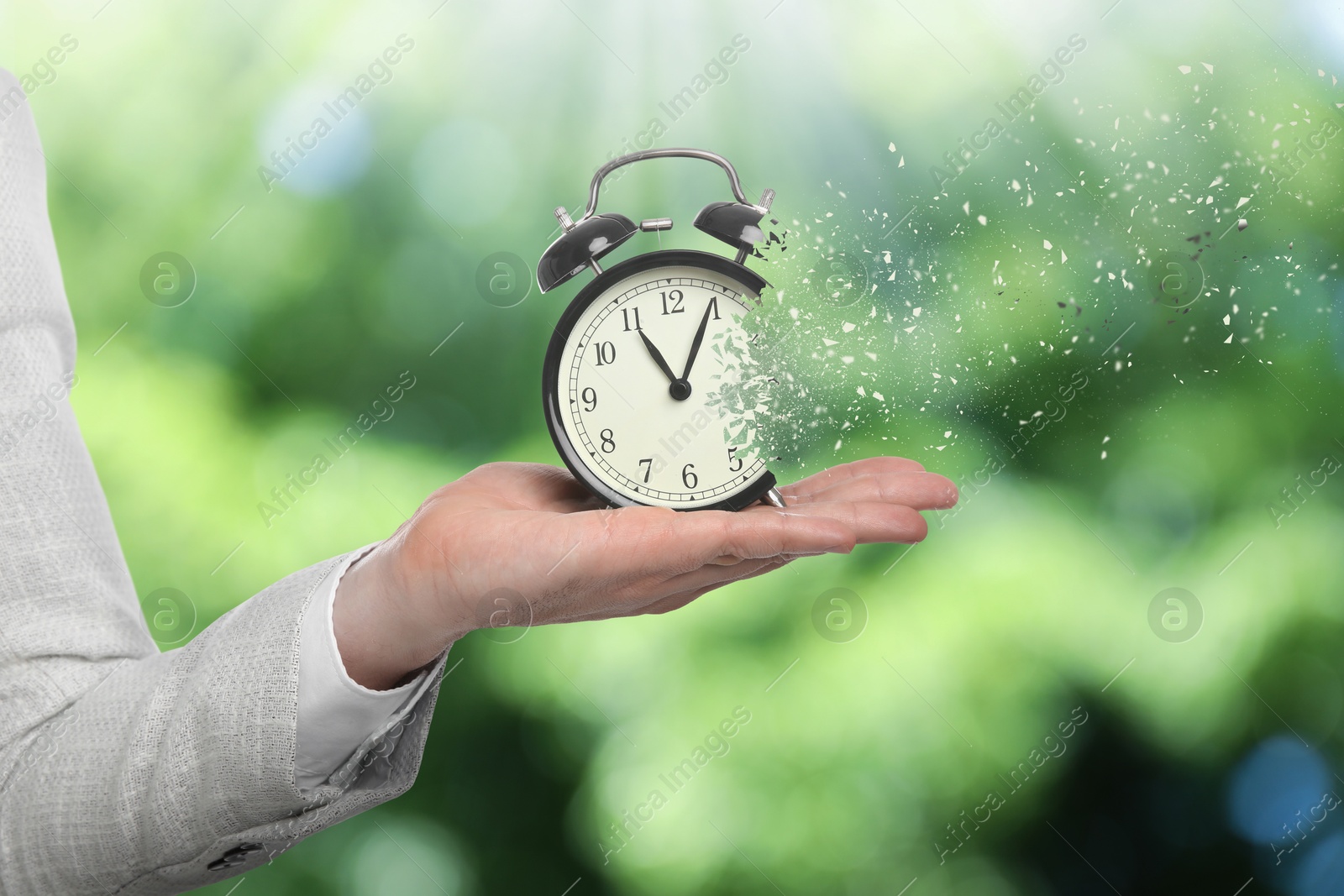 Image of Time running out. Woman with dissolving alarm clock on blurred background, closeup