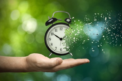 Image of Time running out. Man with dissolving alarm clock on blurred background, closeup
