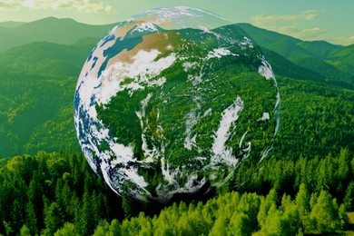 Image of Save the planet. Beautiful mountains and planet Earth, double exposure