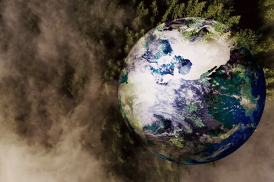 Image of Save the planet. Aerial view of coniferous forest and planet Earth, double exposure