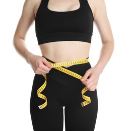 Photo of Woman with measuring tape showing her slim body against white background, closeup