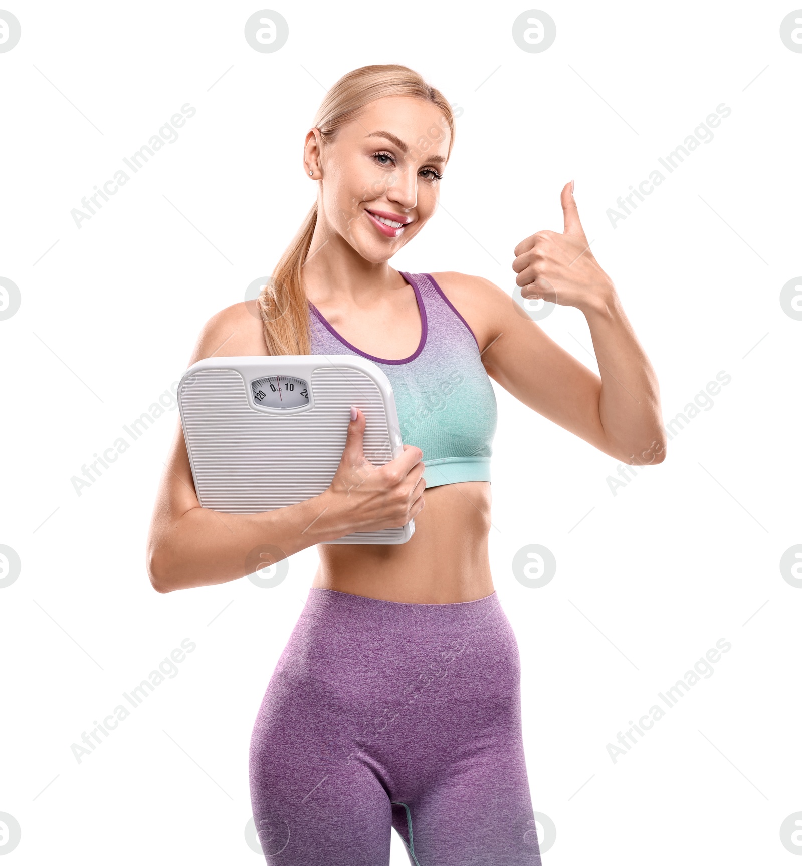Photo of Happy woman with floor scale showing thumb up on white background