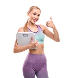 Photo of Happy woman with floor scale showing thumb up on white background