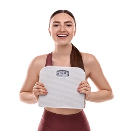 Photo of Happy woman with floor scale on white background