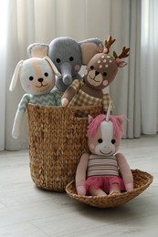 Funny toys in basket on floor. Decor for children's room interior