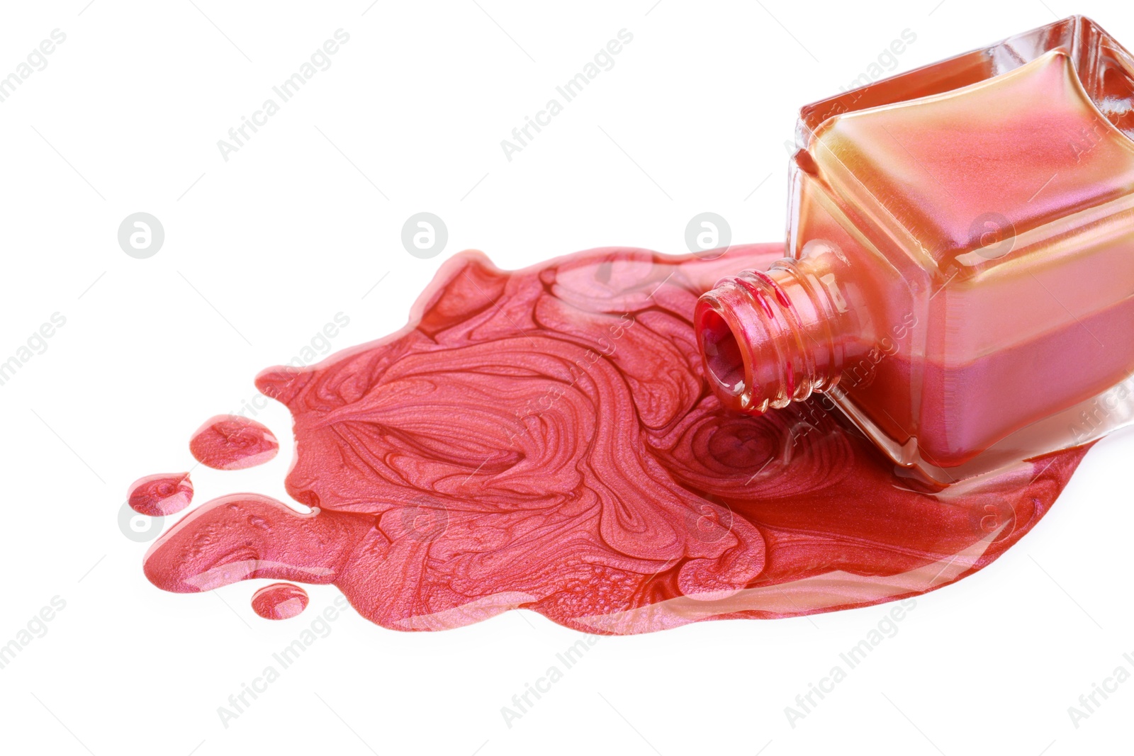 Photo of Overturned bottle of bright nail polish isolated on white