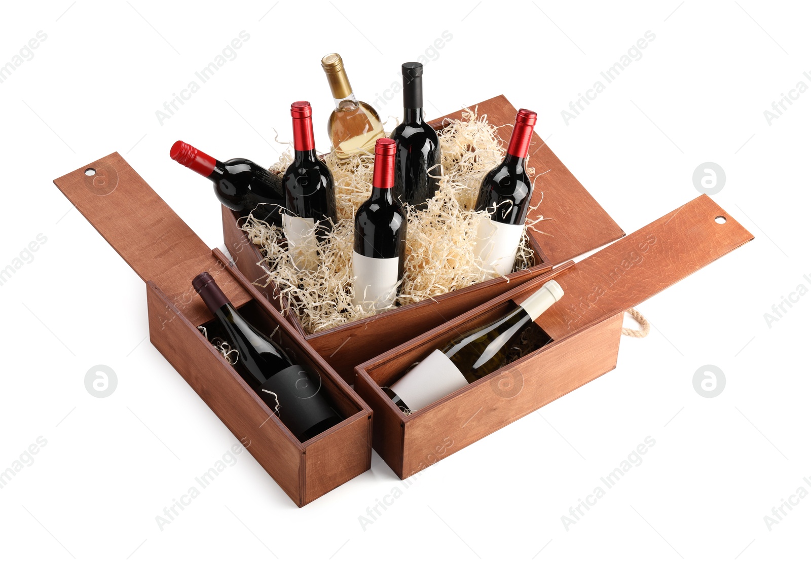 Photo of Wooden gift boxes with wine bottles isolated on white