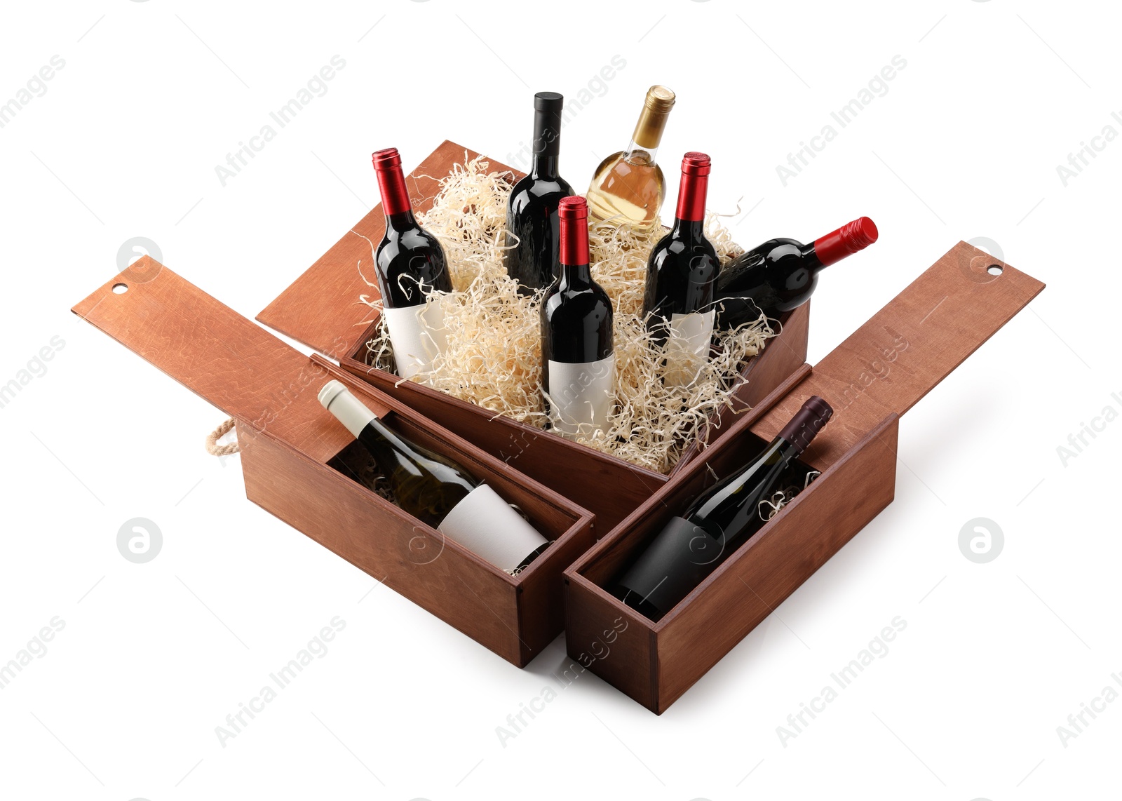 Photo of Wooden gift boxes with wine bottles isolated on white