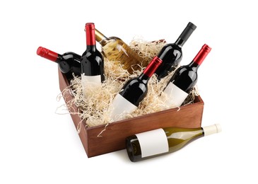 Wooden gift box with wine bottles isolated on white